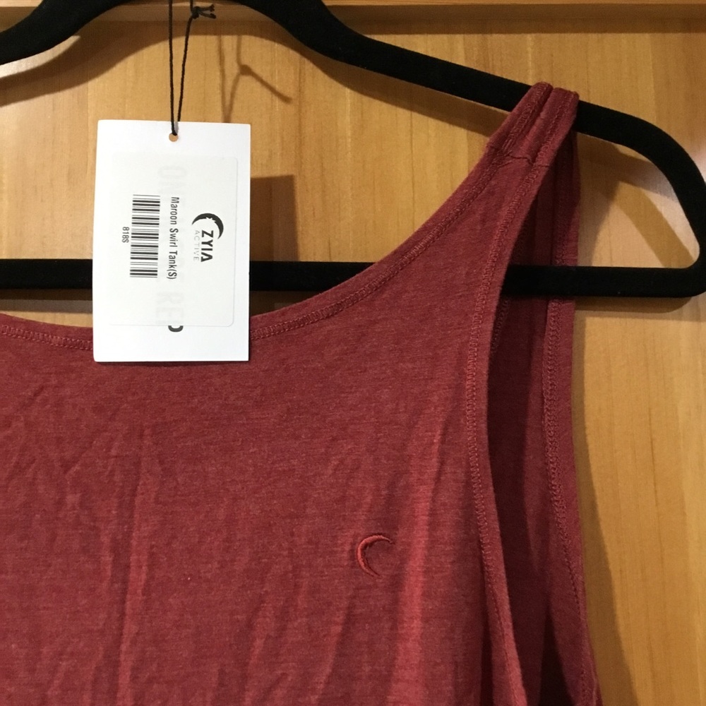Like new ZYIA Active Swirl tank